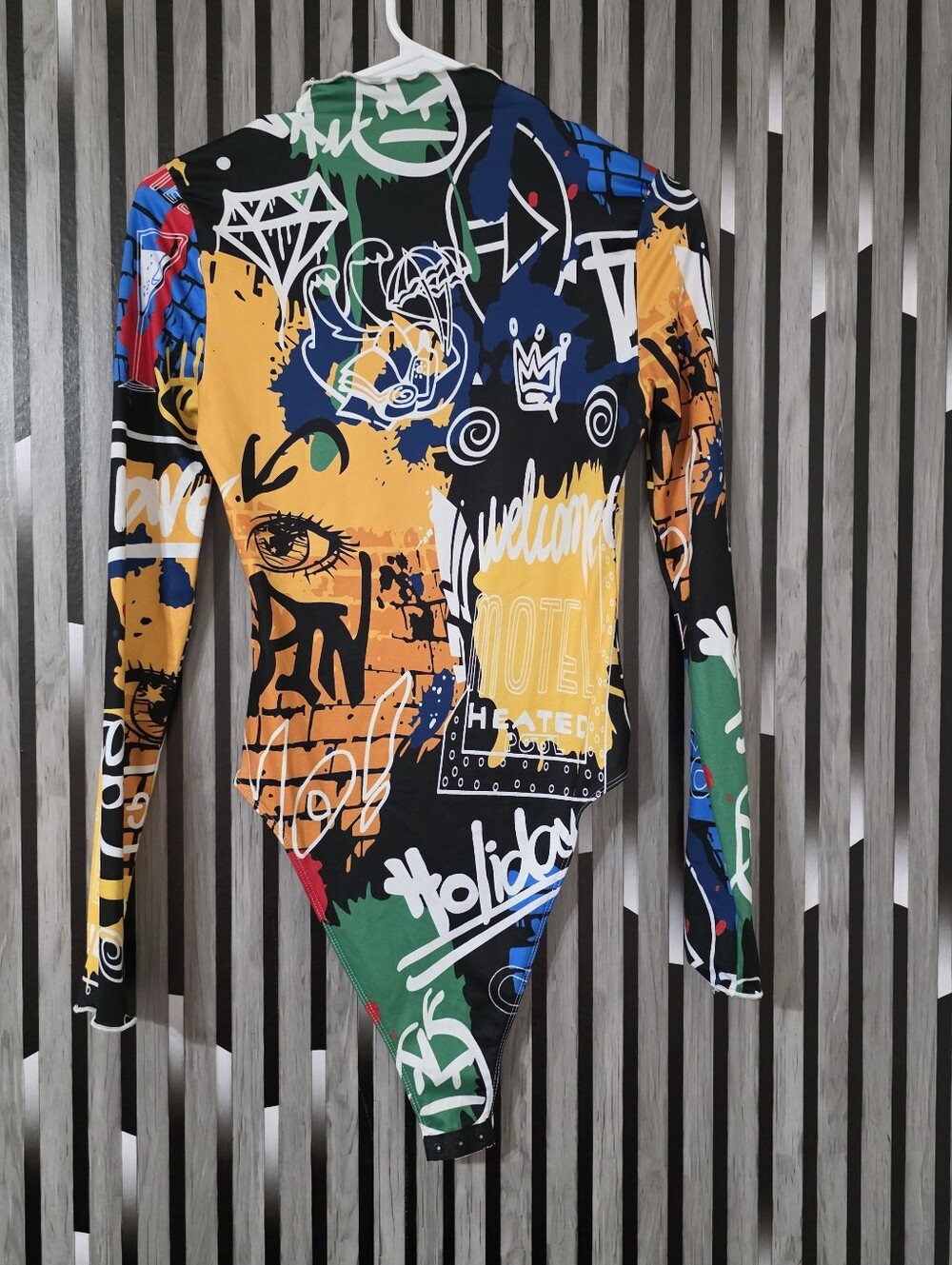 TitleBrand New Graphic Print Long-Sleeve BodysuitDescriptionBrand new, nev